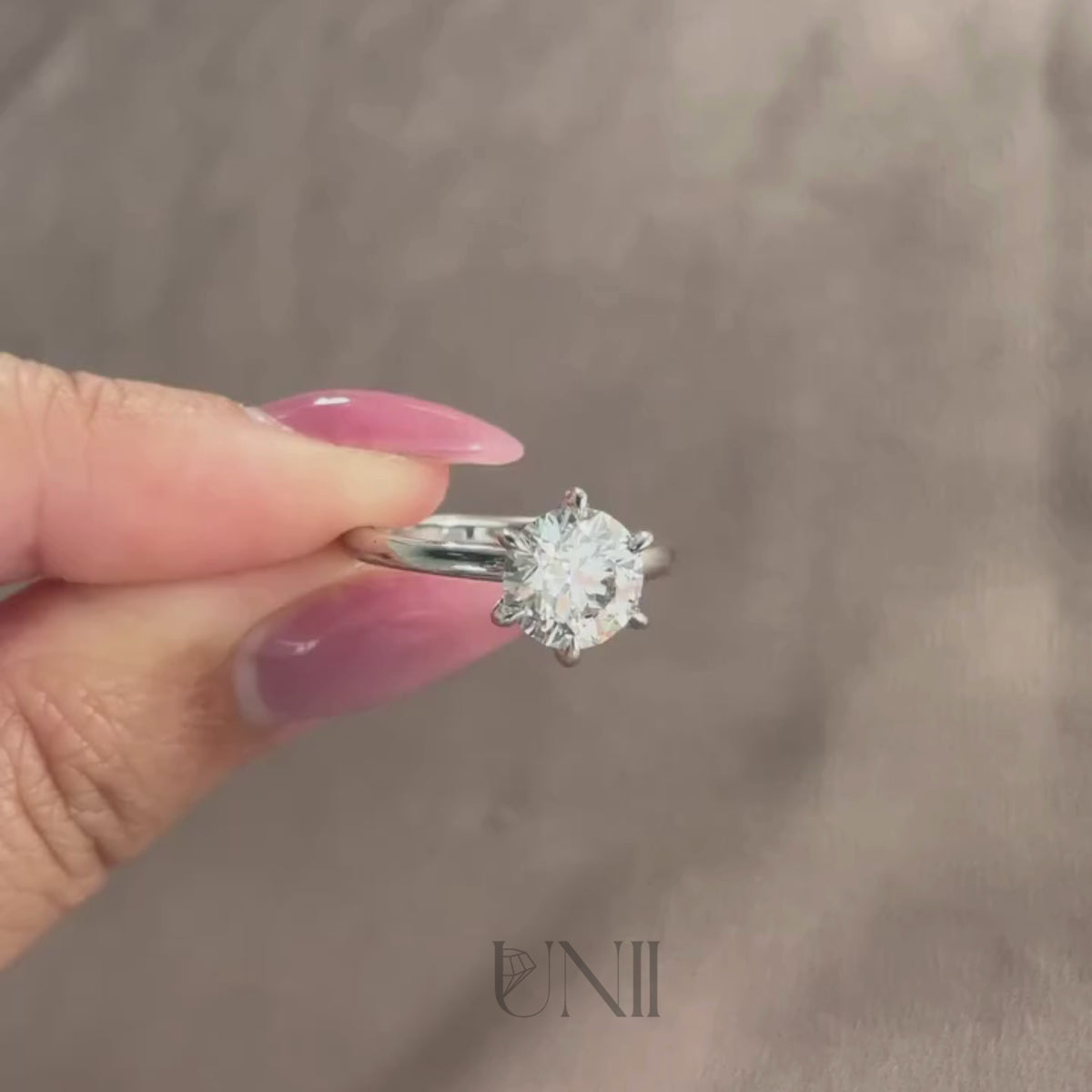 Common :: 1.35ct round cut diamond engagement ring close up video