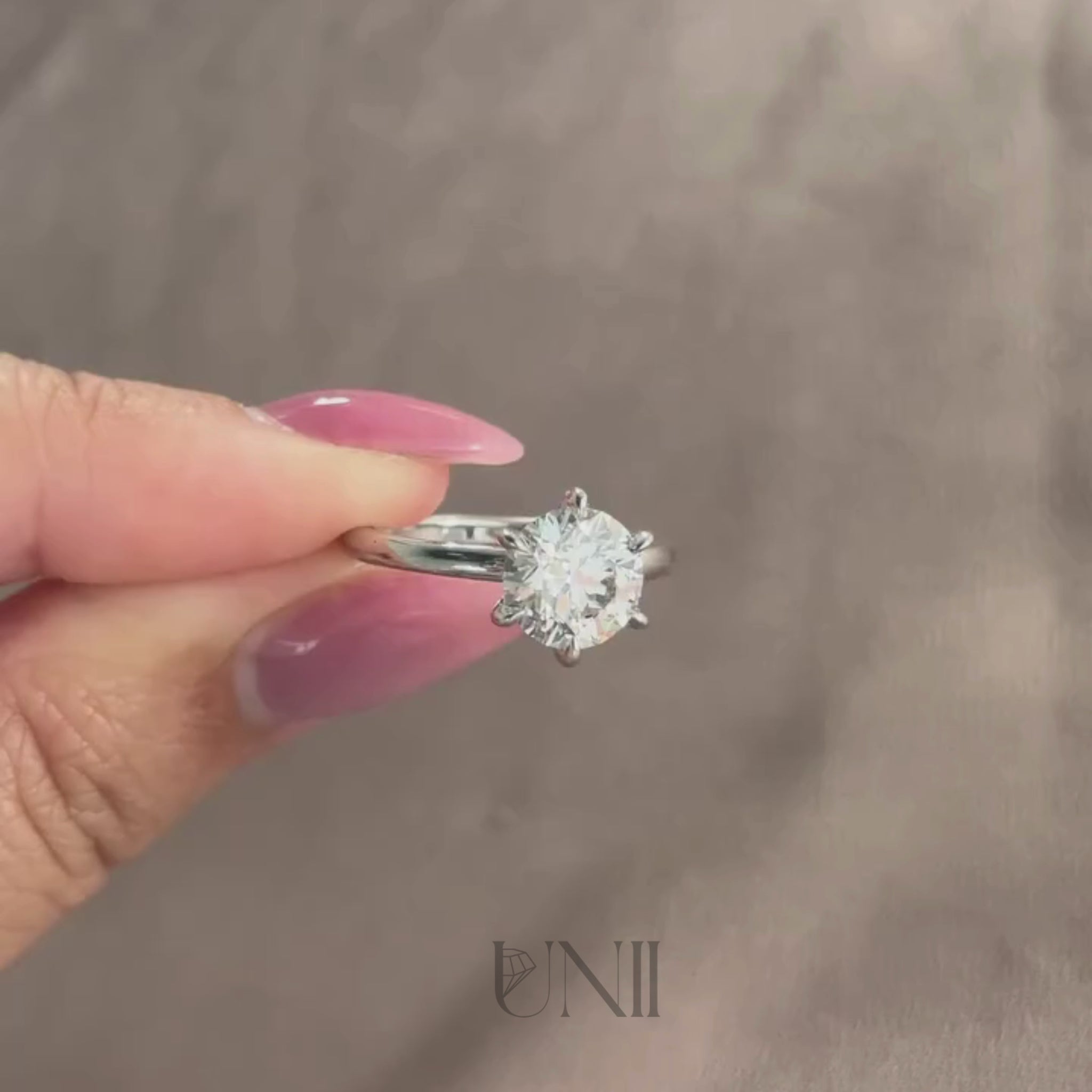Common :: 1.35ct round cut diamond engagement ring close up video