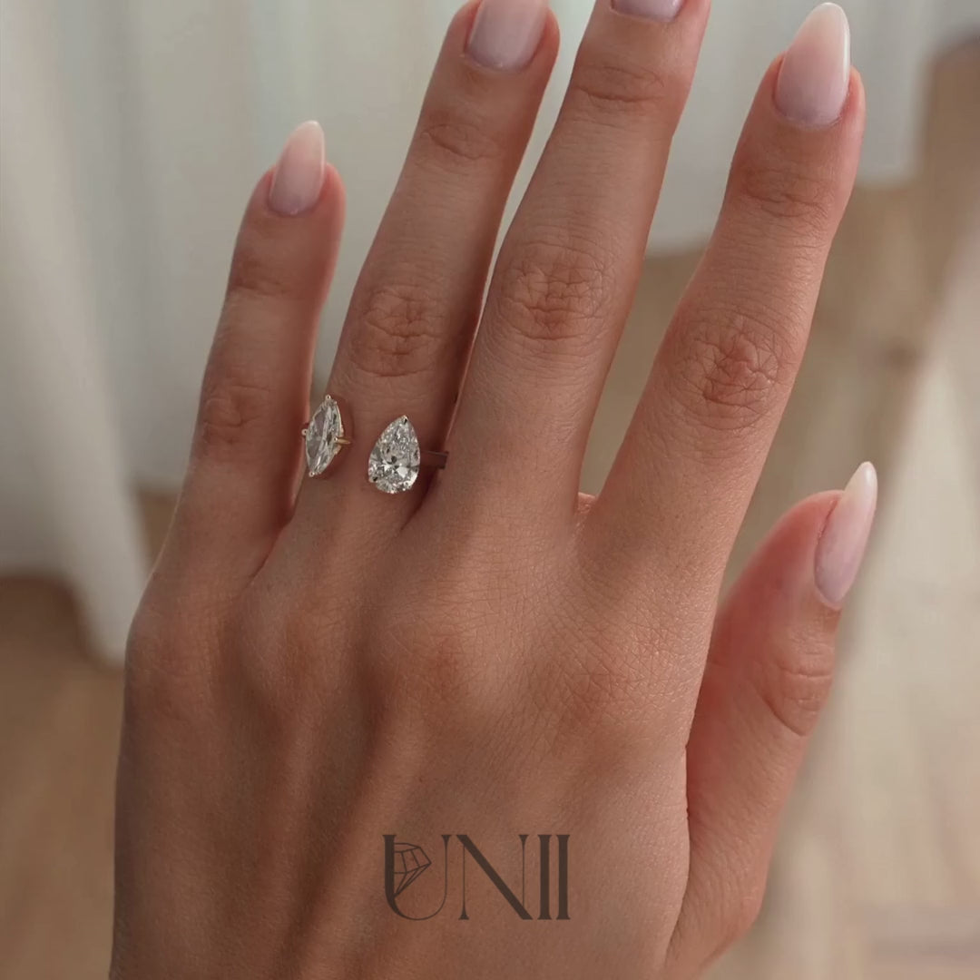 Rose | Yellow :: 1.15ct marquise and 1.65ct pear lab grown diamond toi et moi engagement ring featuring IGI certified diamonds. A romantic two-stone design symbolizing “you and me,” combining marquise elegance with pear brilliance for a modern luxury engagement ring.