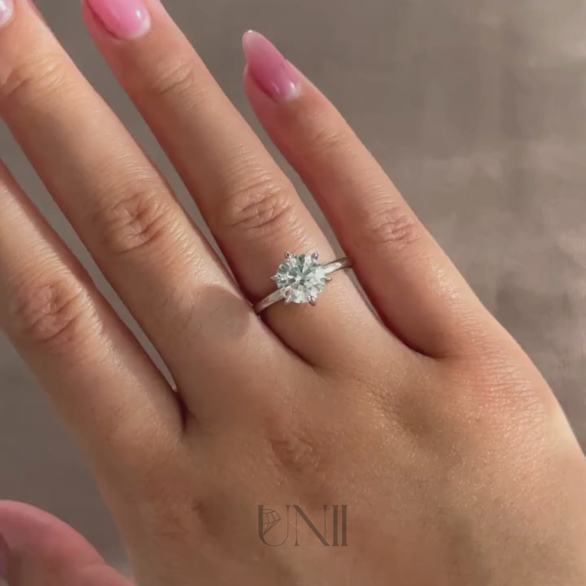 Common :: IGI certified round diamond solitaire engagement ring video