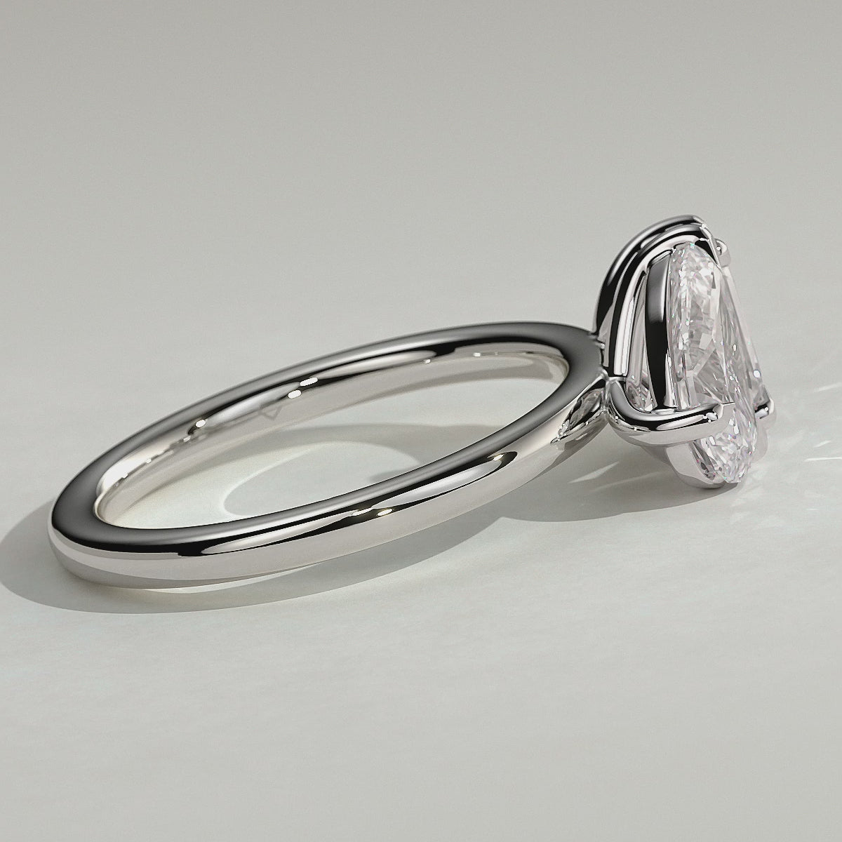 White :: Elvoria pear and emerald toi et moi lab grown diamond engagement ring 360 view white gold IGI certified two stone ring