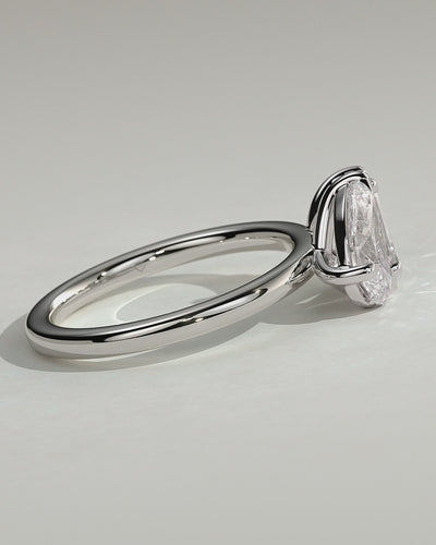 White :: Elvoria pear and emerald toi et moi lab grown diamond engagement ring 360 view white gold IGI certified two stone ring