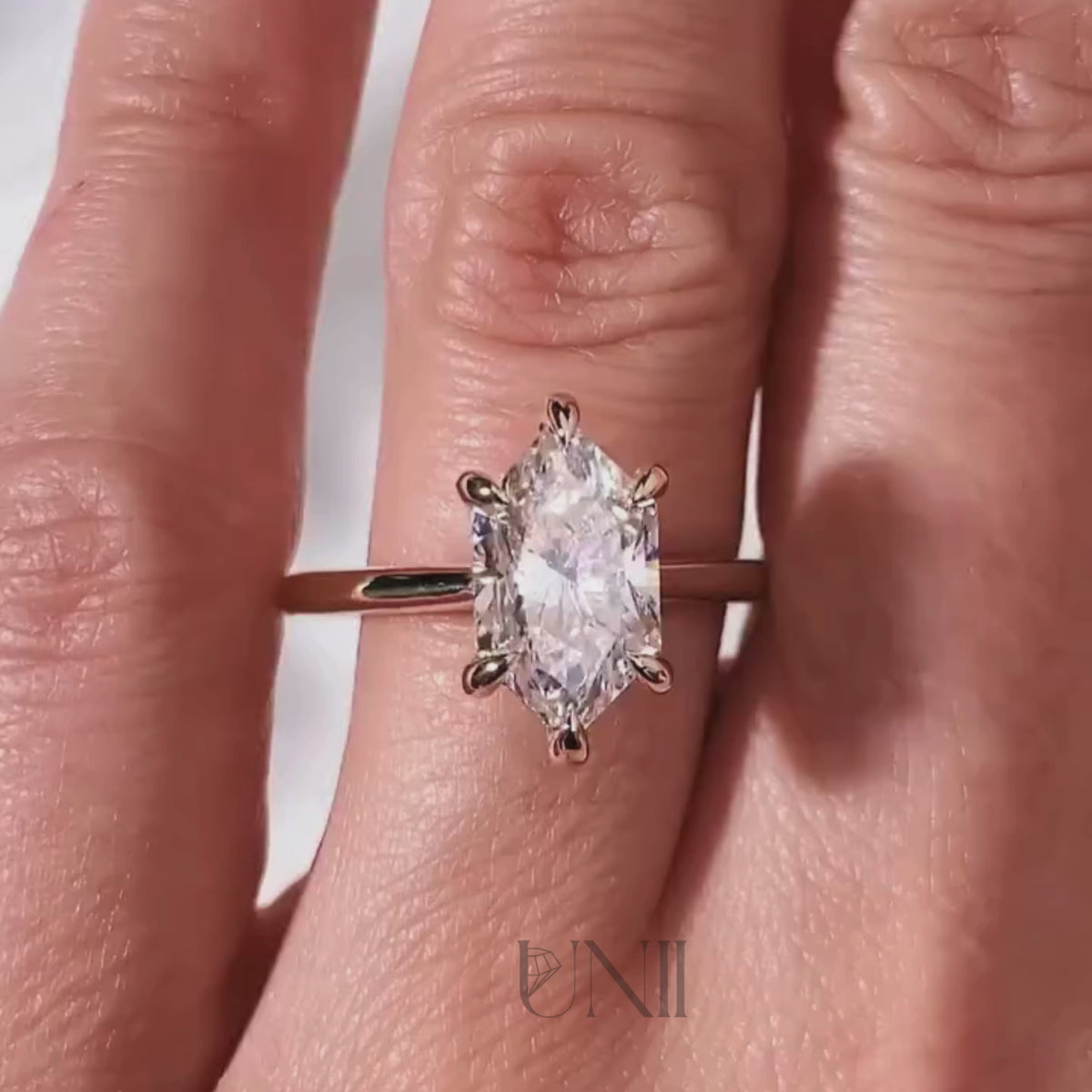 Common :: 2.29ct Hexagon diamond hidden halo engagement ring close up