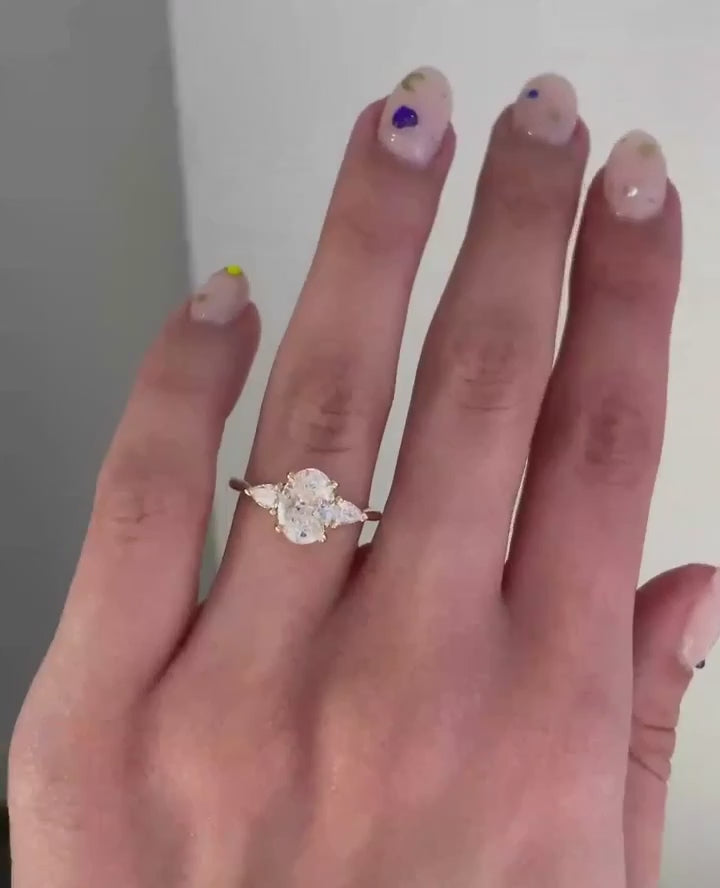 Common :: Unii Jewels 2.30TCW Oval and Pear Three Stone engagement ring video