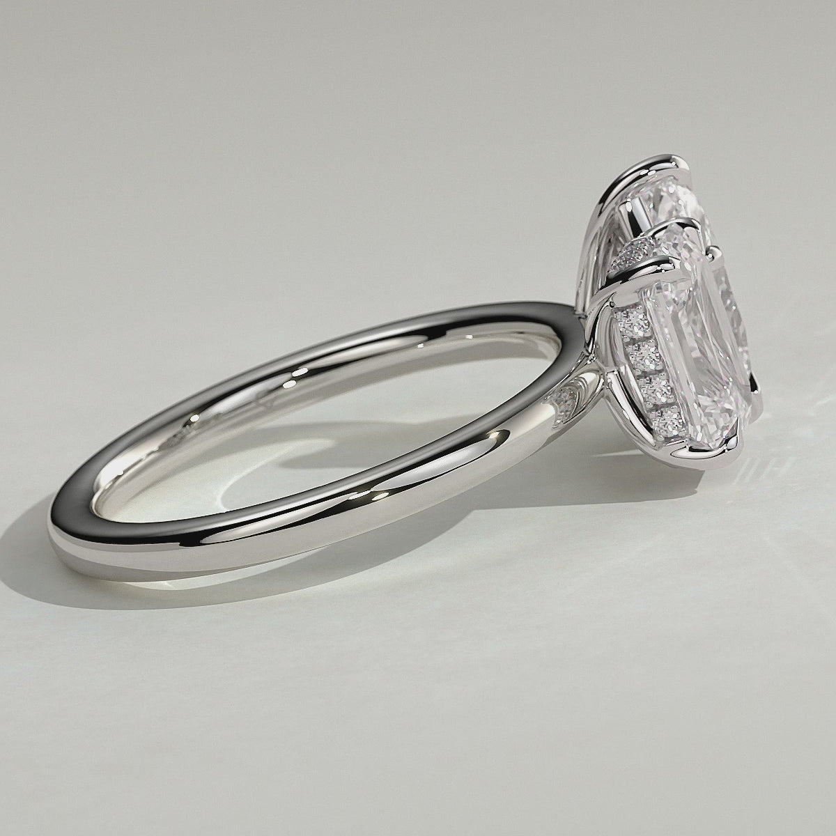 White :: Orinora 1.8ct emerald and 1.5ct pear hidden halo toi et moi lab grown diamond engagement ring 360 view white gold IGI certified two stone ring