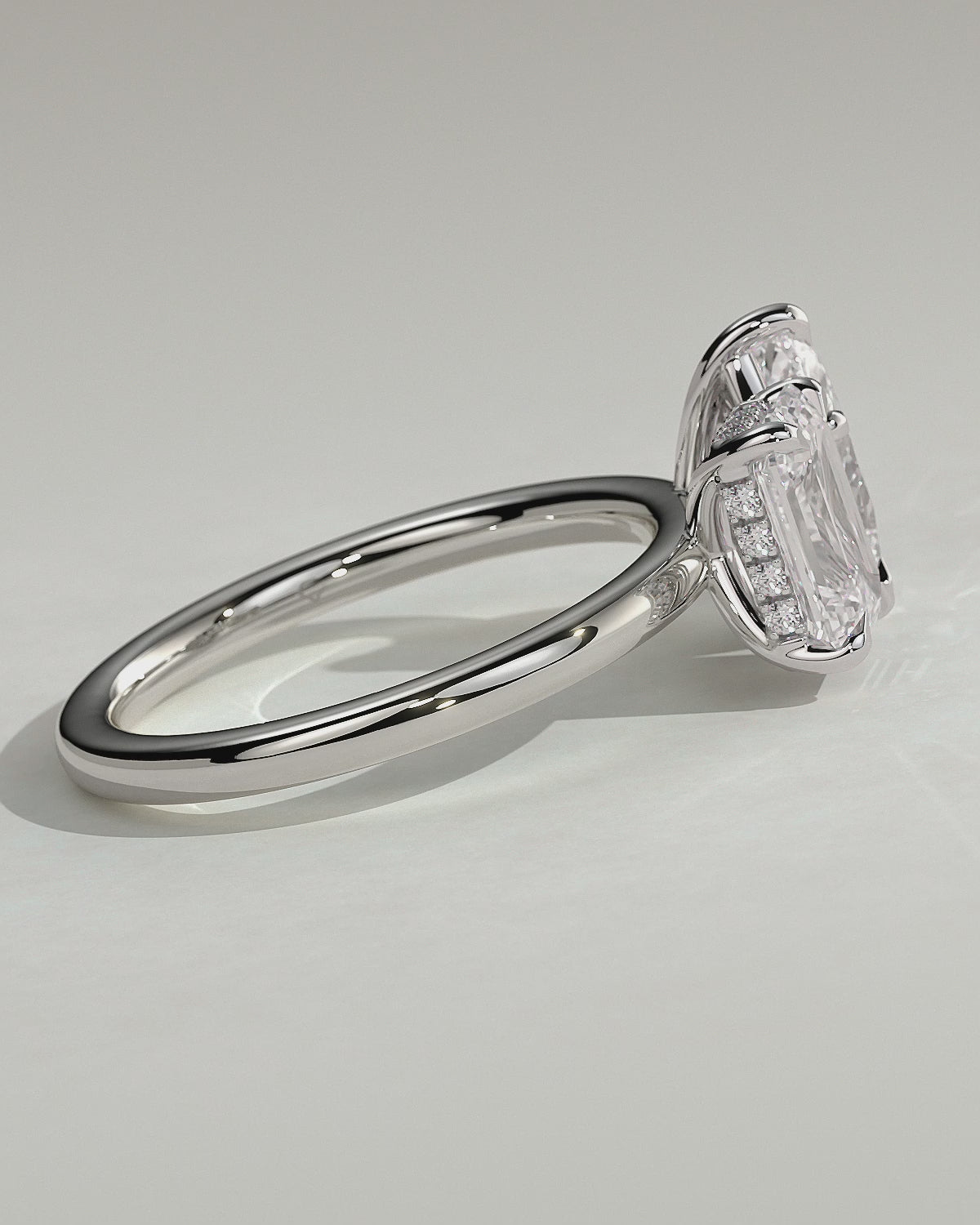 Orinora Emerald and Pear Hidden Halo Toi et Moi Lab Grown Diamond Engagement Ring | IGI Certified