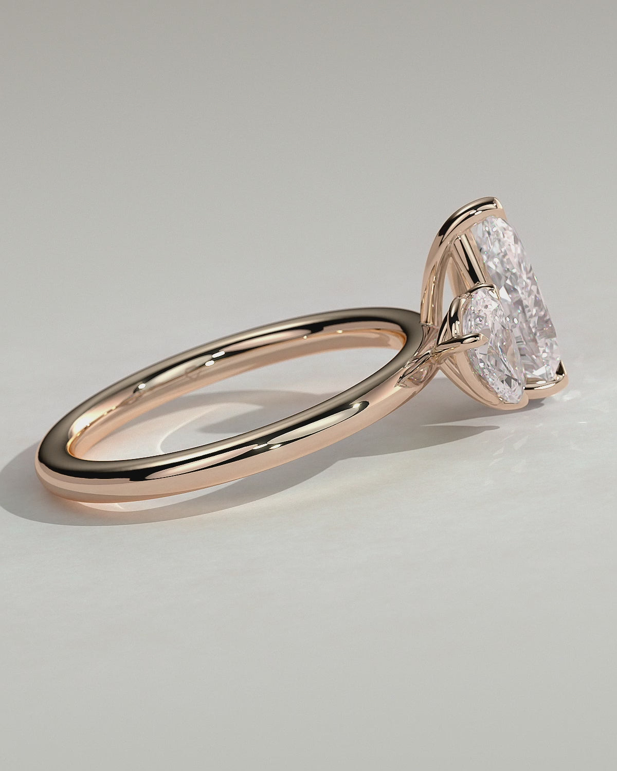 Rose :: Serentique 0.5ct and 1.25ct pear toi et moi lab grown diamond engagement ring 360 view rose gold IGI certified two stone ring