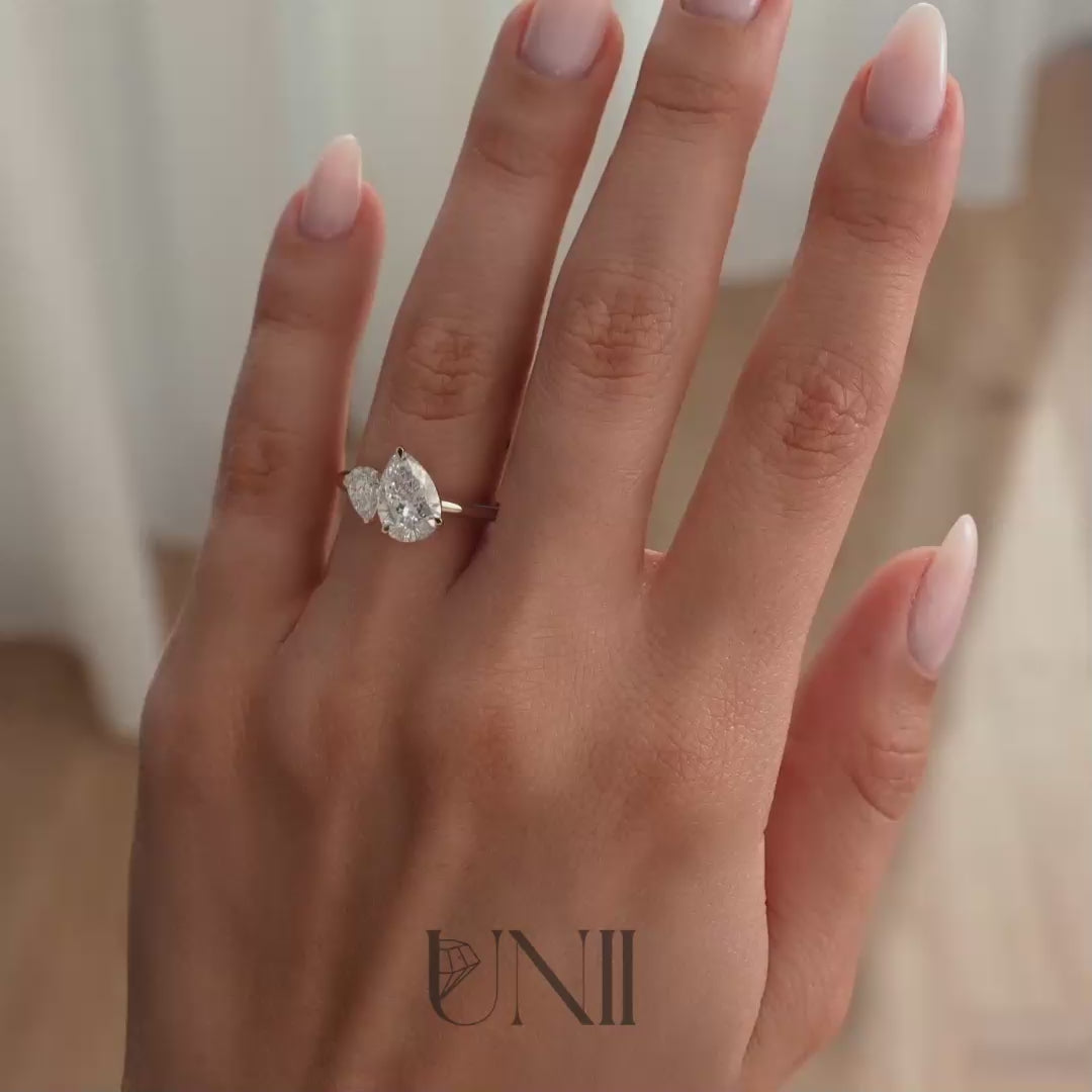 Yellow | Rose :: Serentique 0.5ct & 1.25ct Pear Toi et Moi Lab Grown Diamond Engagement Ring IGI Certified