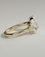 Yellow :: Noriquea oval and pear toi et moi lab grown diamond engagement ring 360 view yellow gold IGI certified two stone ring