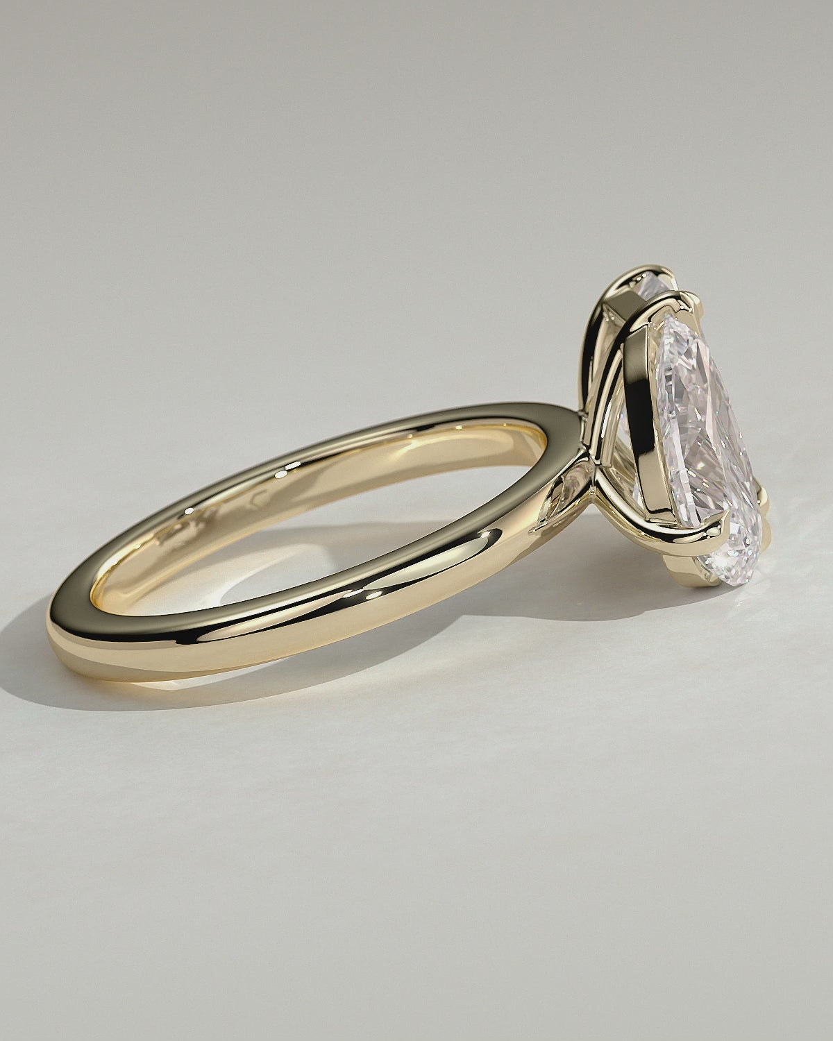 Yellow :: Arviquea 1.5ct pear and 1.8ct radiant toi et moi lab grown diamond engagement ring 360 view yellow gold IGI certified two stone ring