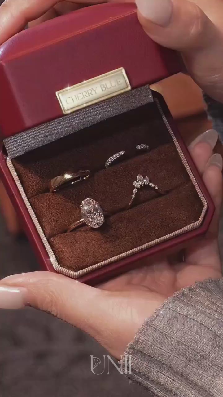 Common :: Designer oval engagement ring with a glamorous four-ring stack design.