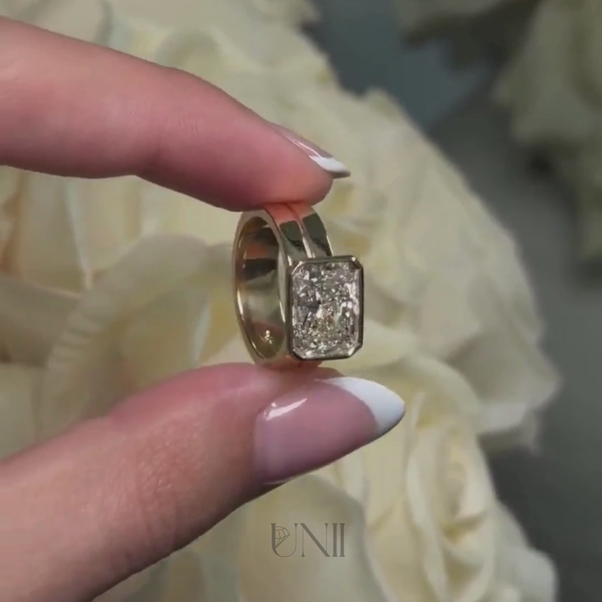 Common :: Unii Jewels 2.50ct Radiant East West Bezel Engagement Ring video