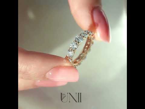 Common :: Elegant 4ct round lab grown diamond eternity ring in rose gold with IGI certified diamonds. A full diamond band featuring a trellis setting that enhances brilliance and creates a bold modern luxury look.