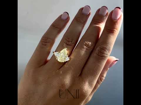Common :: Zenvorae 5.17 carat yellow pear three stone lab grown diamond engagement ring IGI certified full ring video fancy yellow diamond