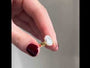 Common :: Close-up video of the 3.00CT oval IGI-certified lab grown diamond.