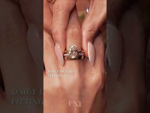 Common :: Designer oval engagement ring with a glamorous four-ring stack design.