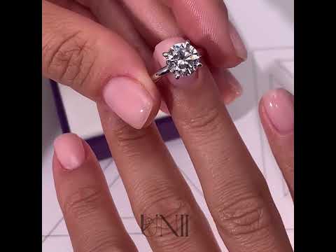 Common :: Zenviquea round hidden halo lab grown diamond engagement ring sparkle close up IGI certified video