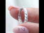 White | Rose :: 2ct round lab grown diamond eternity ring in white gold featuring IGI certified diamonds. Designed with a trellis setting for an elegant woven look, this full diamond band delivers maximum brilliance and modern luxury styling.