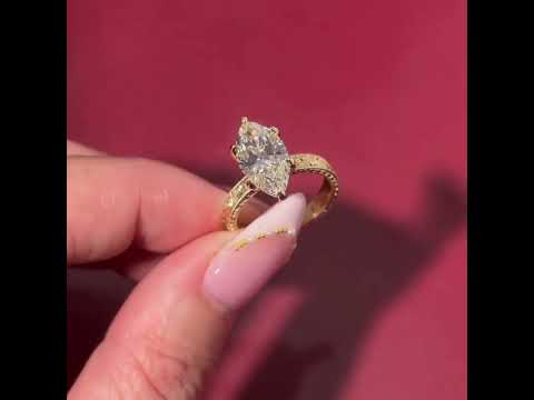 Common :: Video showcase of a 2.00CT marquise lab grown diamond vintage solitaire engagement ring.
