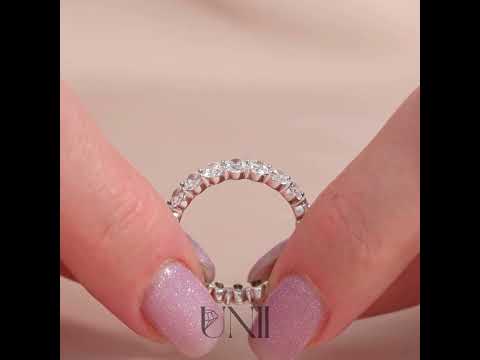 Common :: 3ct oval lab grown diamond eternity ring in white gold featuring IGI certified diamonds. A bold full diamond band with brilliant sparkle and elongated oval design, perfect for stacking, weddings, and statement luxury wear.