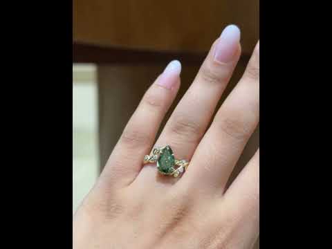 Common :: Video showcasing a 2.20TCW green pear lab grown diamond nature-inspired engagement ring.
