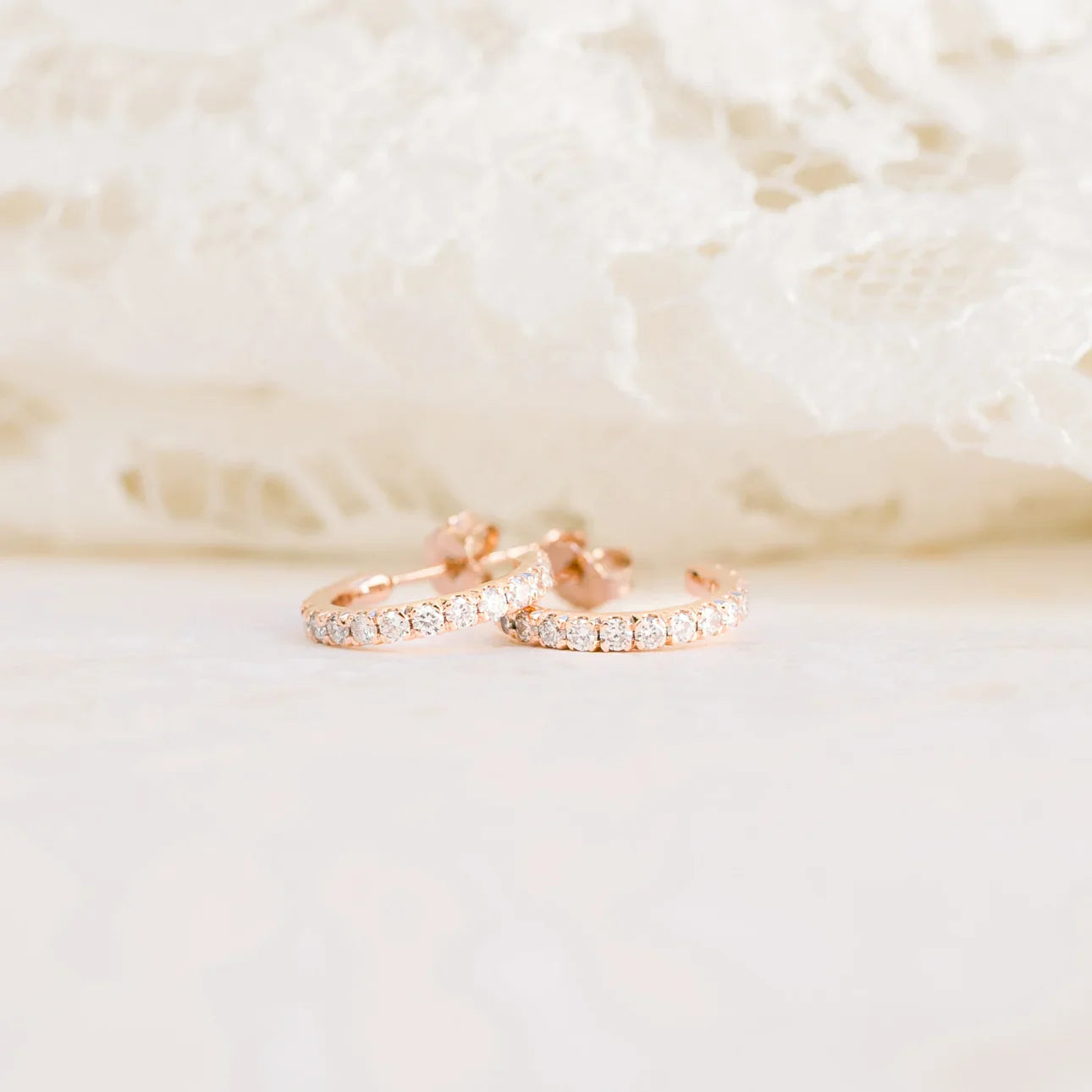 J HUGGIE HOOP EARRINGS