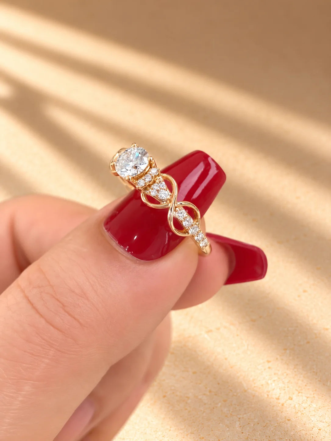 Common :: Nature-inspired round diamond engagement ring featuring a delicate 2MM band.