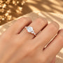 Common :: 1CT Round center with 0.15TCW Round Lab Grown Diamond accents
