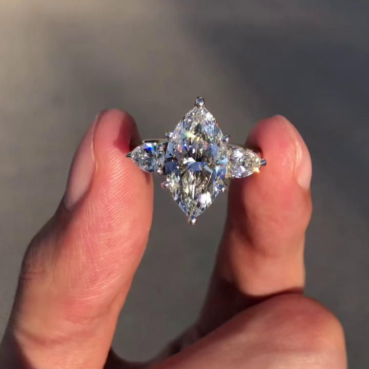Marquise 3.80tcw Lab Grown Diamond Three Stone Engagement Ring, D-E-F Color, VVS-VS Clarity - IGI Certified