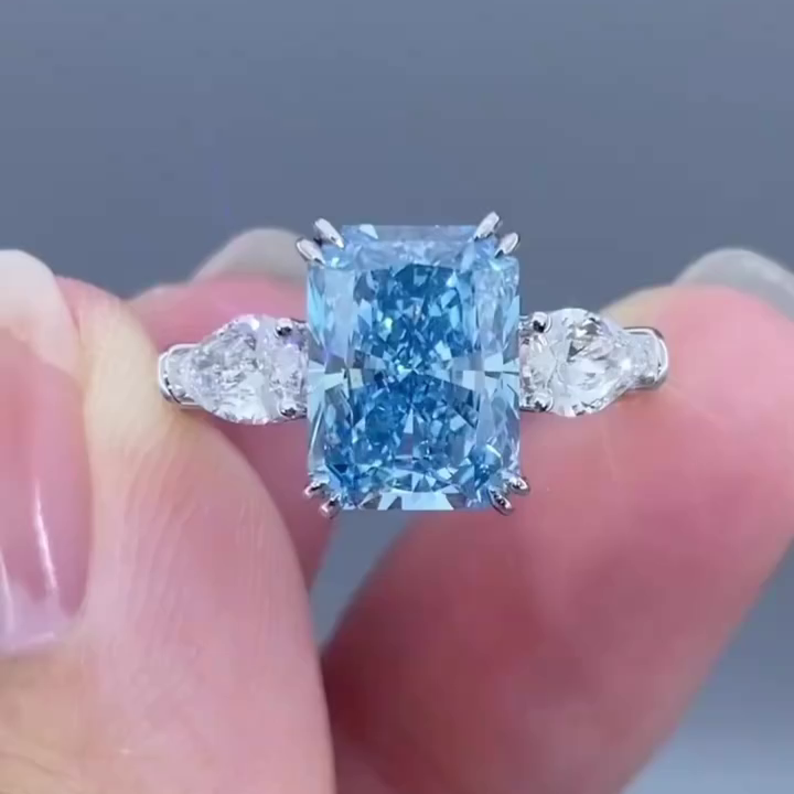Radiant 4.50tcw Fancy Blue Lab Diamond Ring with Pear Sides | 3 Stone | IGI Certified