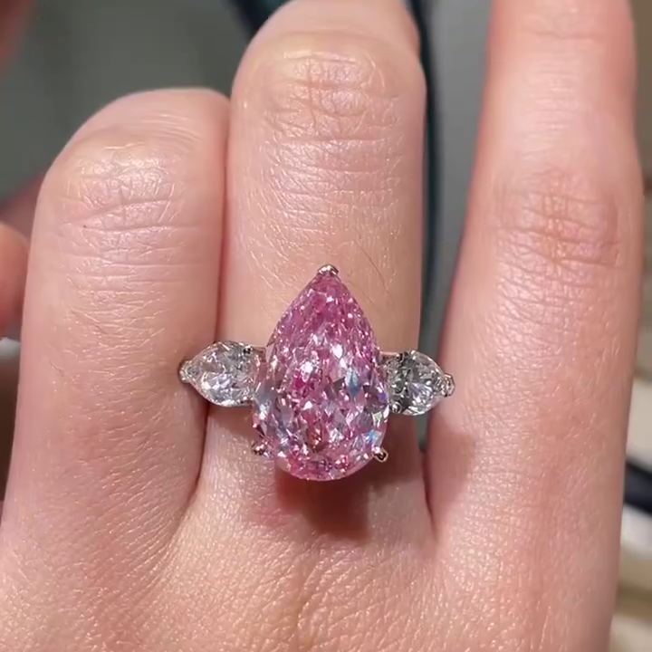 Fancy Pink 11.00tcw Pear Lab Grown Diamond Three Stone Engagement Ring | IGI Certified