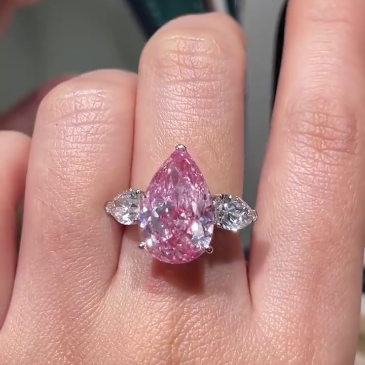 Fancy Pink 11.00tcw Pear Lab Grown Diamond Three Stone Engagement Ring | IGI Certified