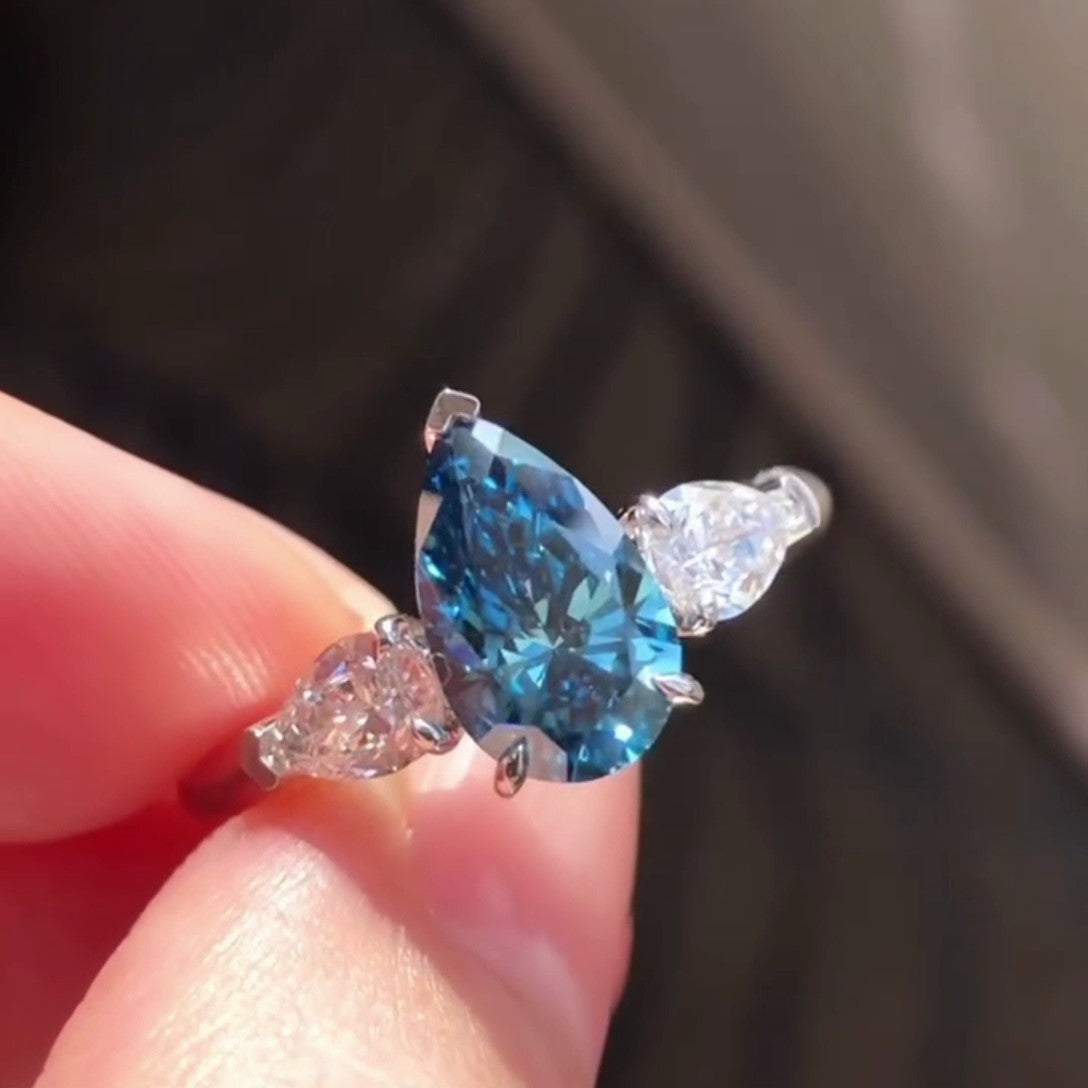 Pear Fancy Blue 2.10tcw Lab Diamond Three Stone Pavé Ring | IGI VVS–VS