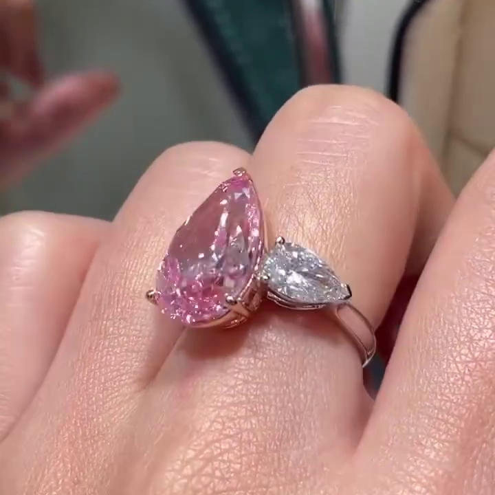 Fancy Pink 11.00tcw Pear Lab Grown Diamond Three Stone Engagement Ring | IGI Certified