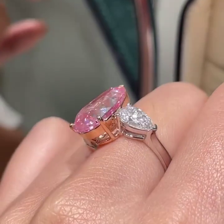 Fancy Pink 11.00tcw Pear Lab Grown Diamond Three Stone Engagement Ring | IGI Certified