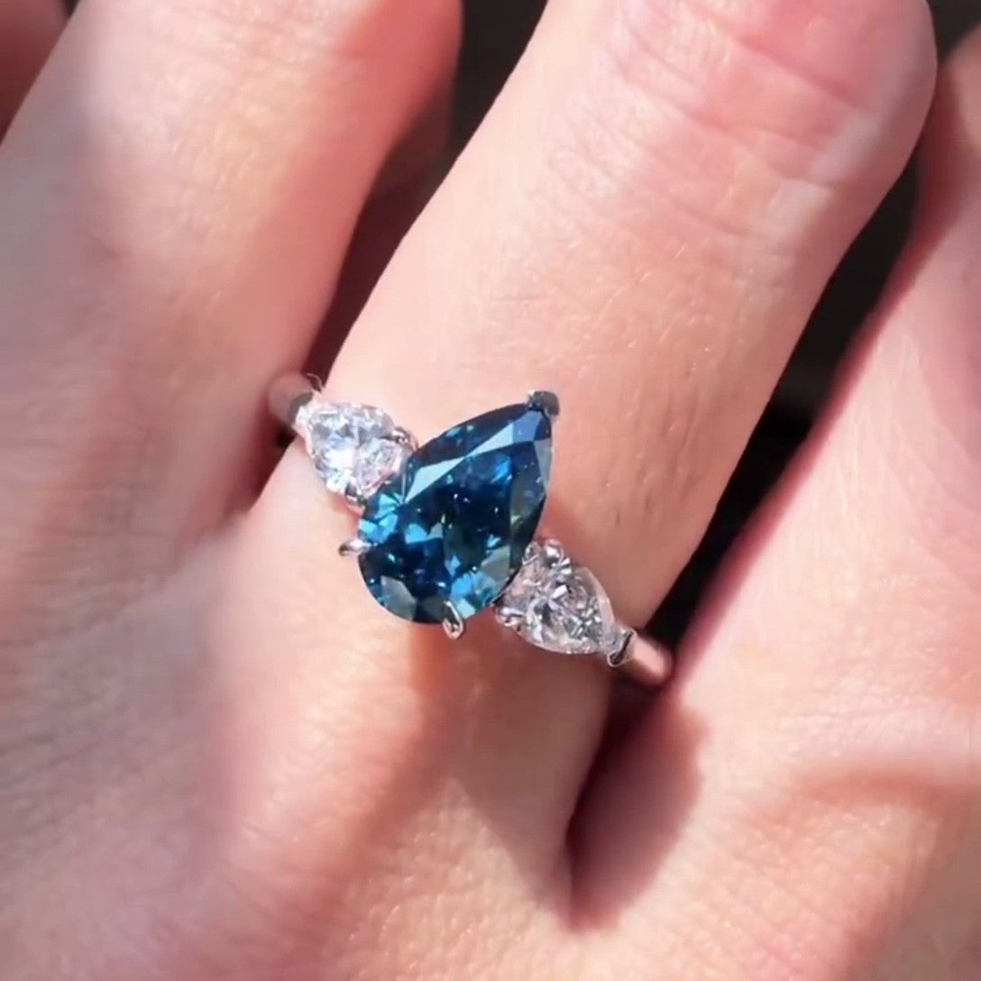 Pear Fancy Blue 2.10tcw Lab Diamond Three Stone Pavé Ring | IGI VVS–VS