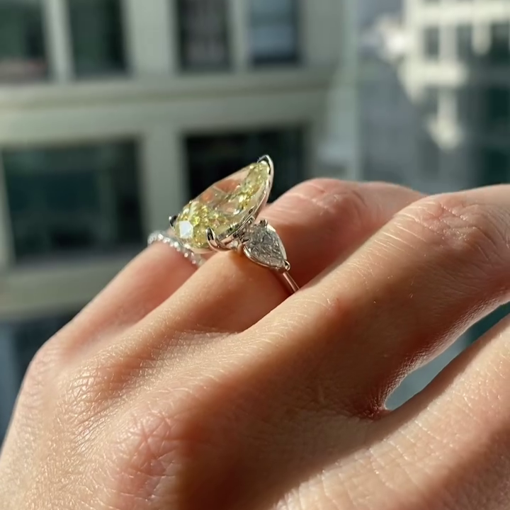 Pear Fancy Yellow 8.80tcw Lab Diamond Three Stone Ring | IGI VVS–VS