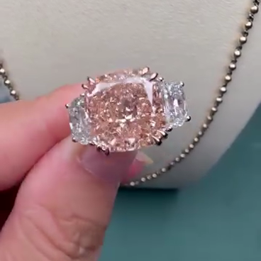 Fancy Pink 7.00tcw Lab Diamond 3-Stone Engagement Ring | 5ct Cushion Center + 2ct Side Stones | IGI Certified