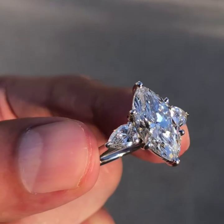 Marquise 3.80tcw Lab Grown Diamond Three Stone Engagement Ring, D-E-F Color, VVS-VS Clarity - IGI Certified