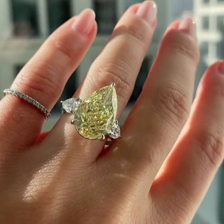 Pear Fancy Yellow 8.80tcw Lab Diamond Three Stone Ring | IGI VVS–VS