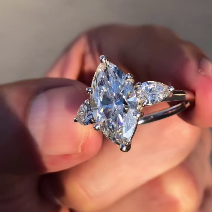 Marquise 3.80tcw Lab Grown Diamond Three Stone Engagement Ring, D-E-F Color, VVS-VS Clarity - IGI Certified