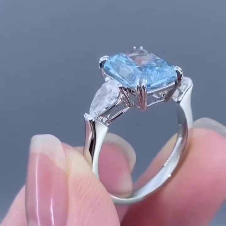 Radiant 4.50tcw Fancy Blue Lab Diamond Ring with Pear Sides | 3 Stone | IGI Certified