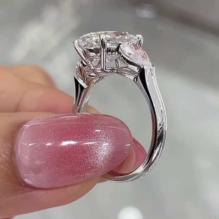 Oval 5.00tcw Lab Grown Diamond 3 Stone Engagement Ring | D-E-F Color VVS-VS Clarity | Pear Side Stones | IGI Certified