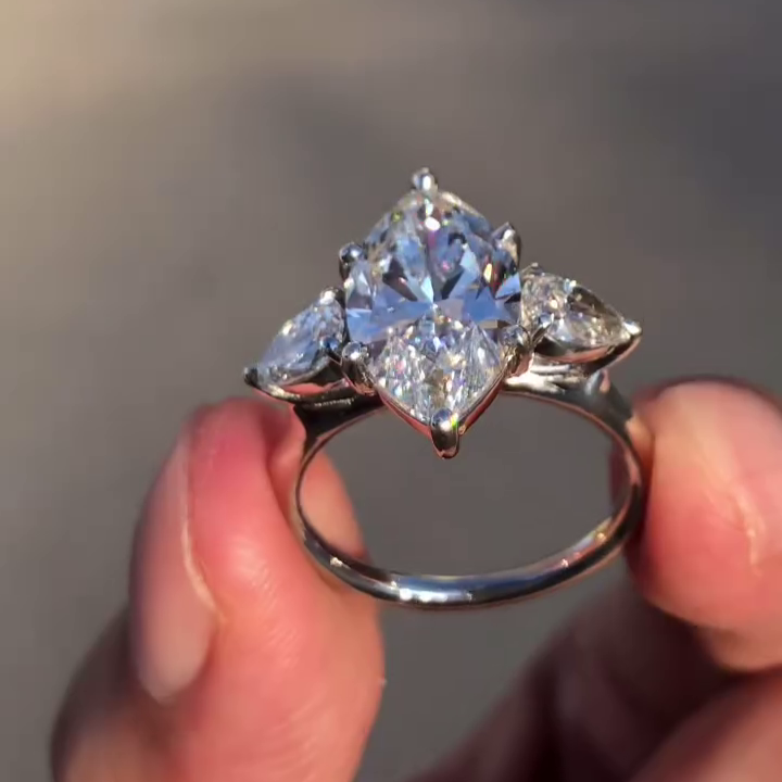 Marquise 3.80tcw Lab Grown Diamond Three Stone Engagement Ring, D-E-F Color, VVS-VS Clarity - IGI Certified