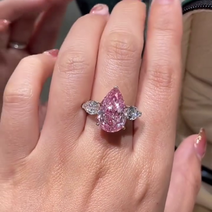 Fancy Pink 11.00tcw Pear Lab Grown Diamond Three Stone Engagement Ring | IGI Certified
