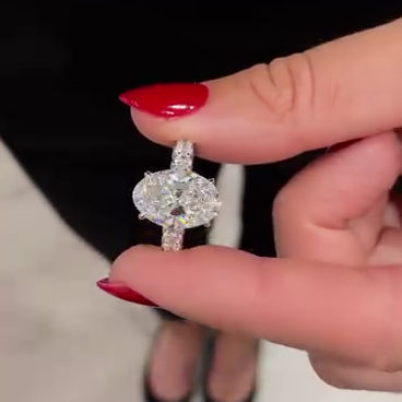 Oval 5.20tcw Lab Diamond Engagement Ring with Side Stones | IGI Certified