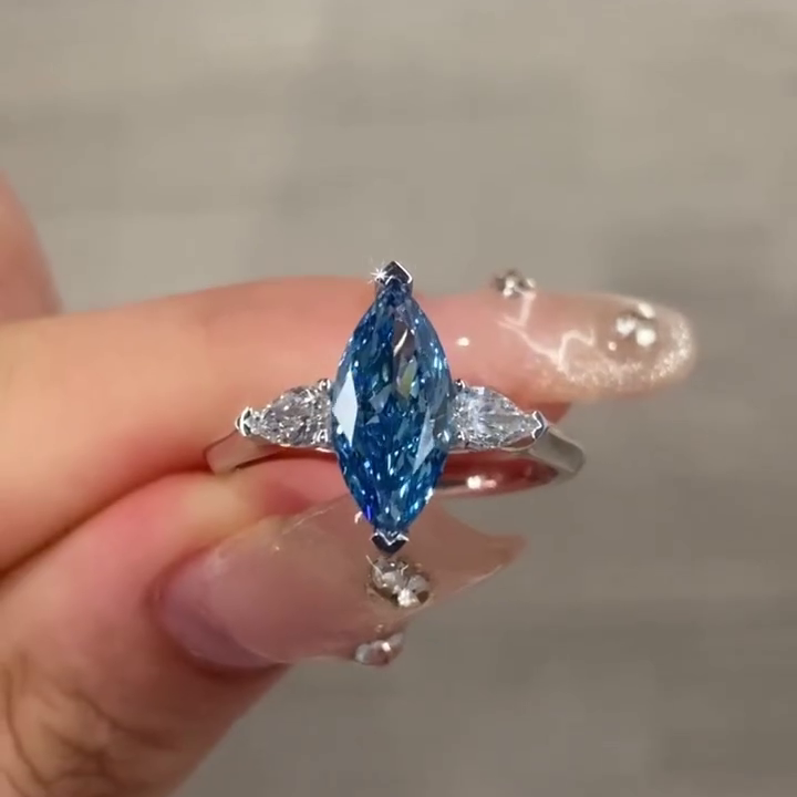 Fancy Blue 1.50tcw Marquise Lab Grown Diamond Three Stone Engagement Ring | IGI Certified | White Gold