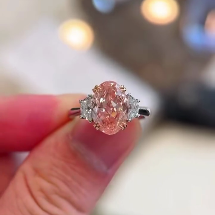 Oval Fancy Pink 3.00tcw Lab Grown Diamond Two Tone Three Stone Engagement Ring, VS Clarity