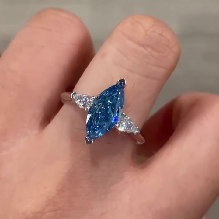Fancy Blue 1.50tcw Marquise Lab Grown Diamond Three Stone Engagement Ring | IGI Certified | White Gold