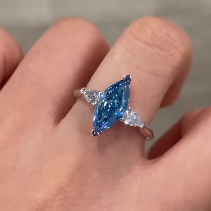 Fancy Blue 1.50tcw Marquise Lab Grown Diamond Three Stone Engagement Ring | IGI Certified | White Gold
